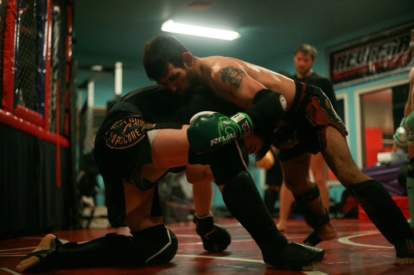 Clinch knee drill in Muay Thai class at Fearless MMA