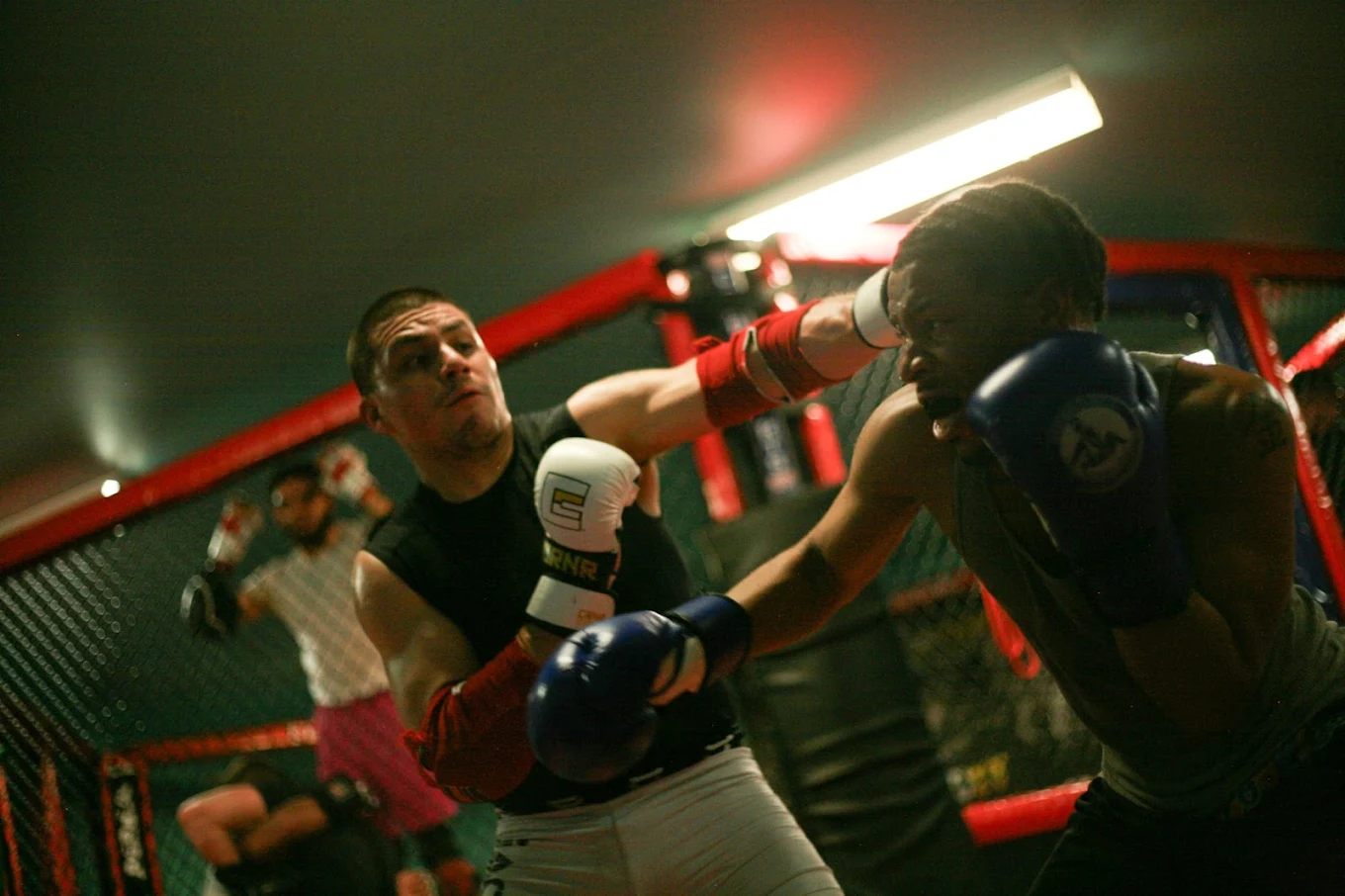 Live MMA sparring inside the cage at Fearless MMA
